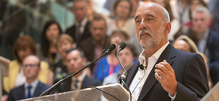 Governor Gabriel Makhlouf speaking at a podium to a group of people